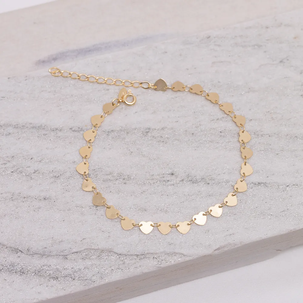 TORNOZELEIRA COM CORAÇÃO LISO BANHO OURO 18K