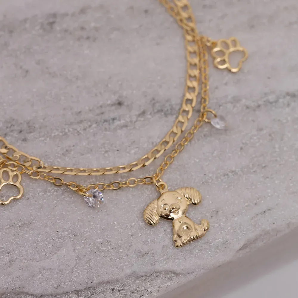 PULSEIRA CORRENTE DUPLA COM CACHORRINHO BANHO OURO 18K