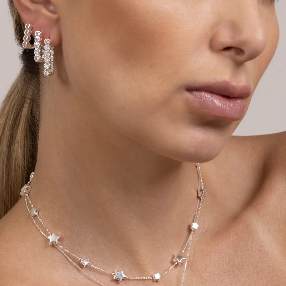 BRINCO ARGOLA QUADRADA P COM ZIRCÔNIA CORAÇÃO CRISTAL BANHO PRATA