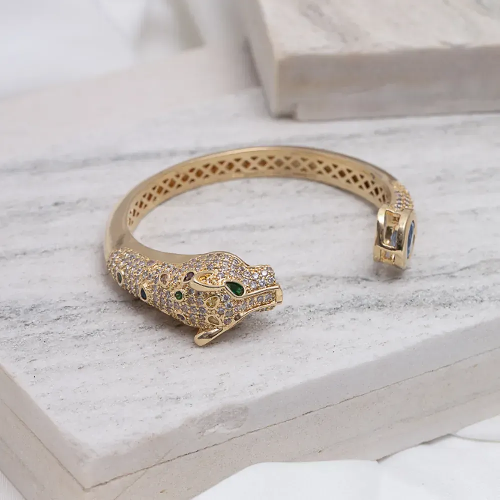 BRACELETE TIGRE COM ZIRCÔNIAS E PEDRA AZUL BANHO OURO 18K