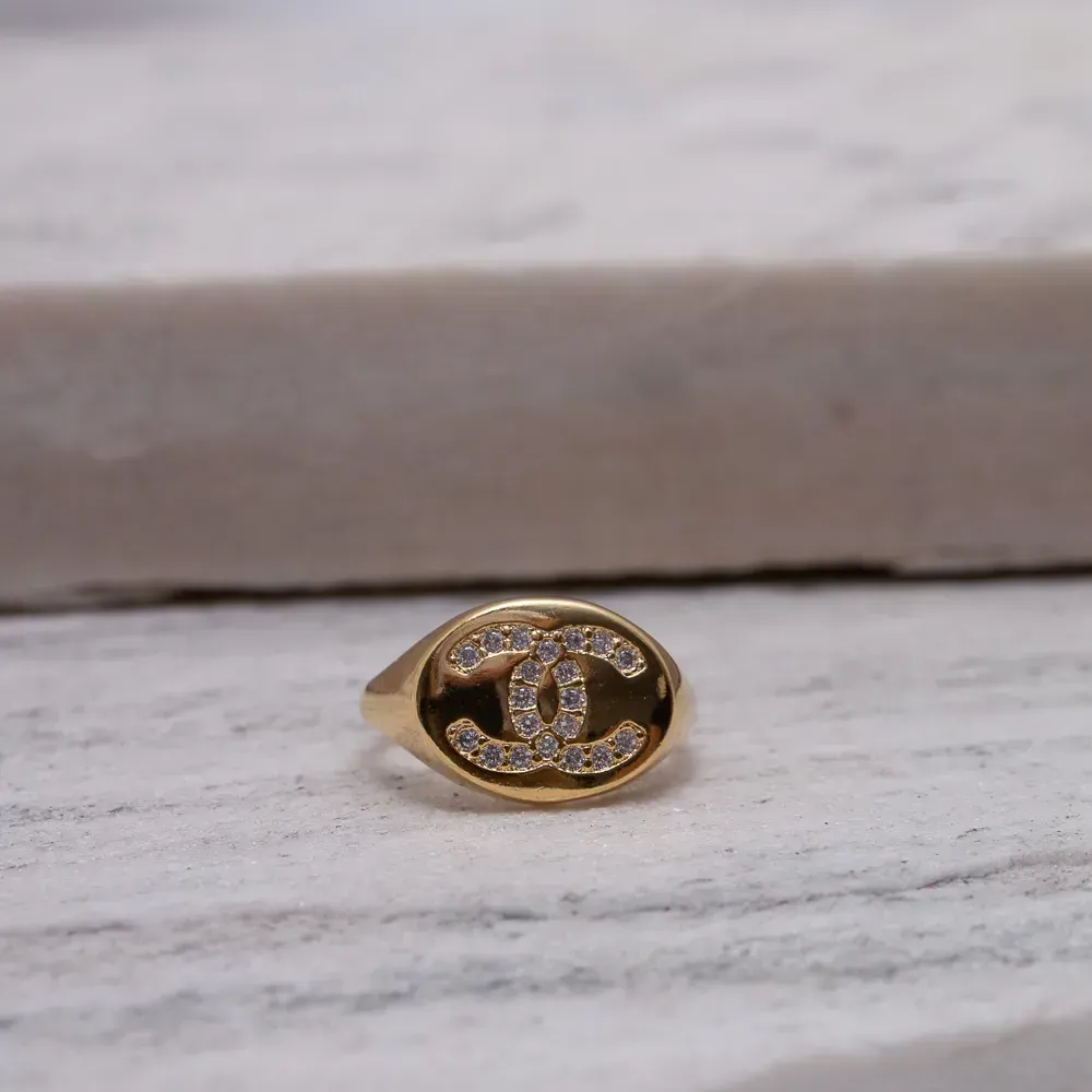 ANEL CHANEL DEDINHO BANHO OURO 18K