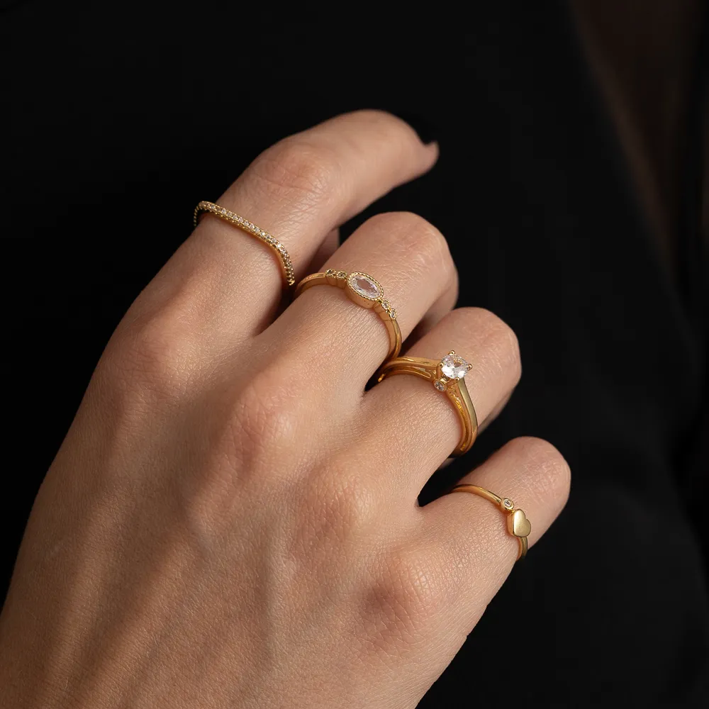 ANEL CORAÇÃO COM PONTO DE LUZ BANHO OURO 18K