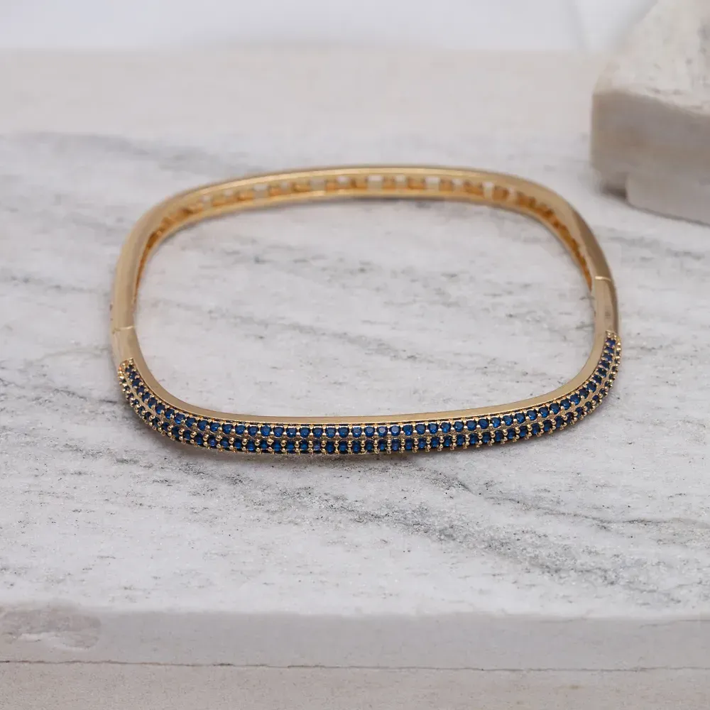 BRACELETE QUADRADO COM ZIRCÔNIAS AZUIS BANHO OURO 18K