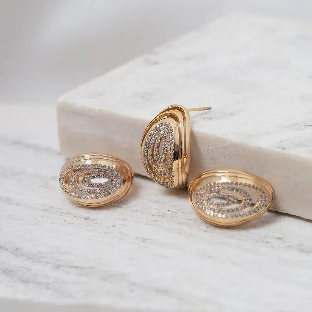 CONJUNTO BRINCO E ANEL OVAIS CRAVEJADO COM ZIRCÔNIAS CRISTAIS BANHO OURO 18K
