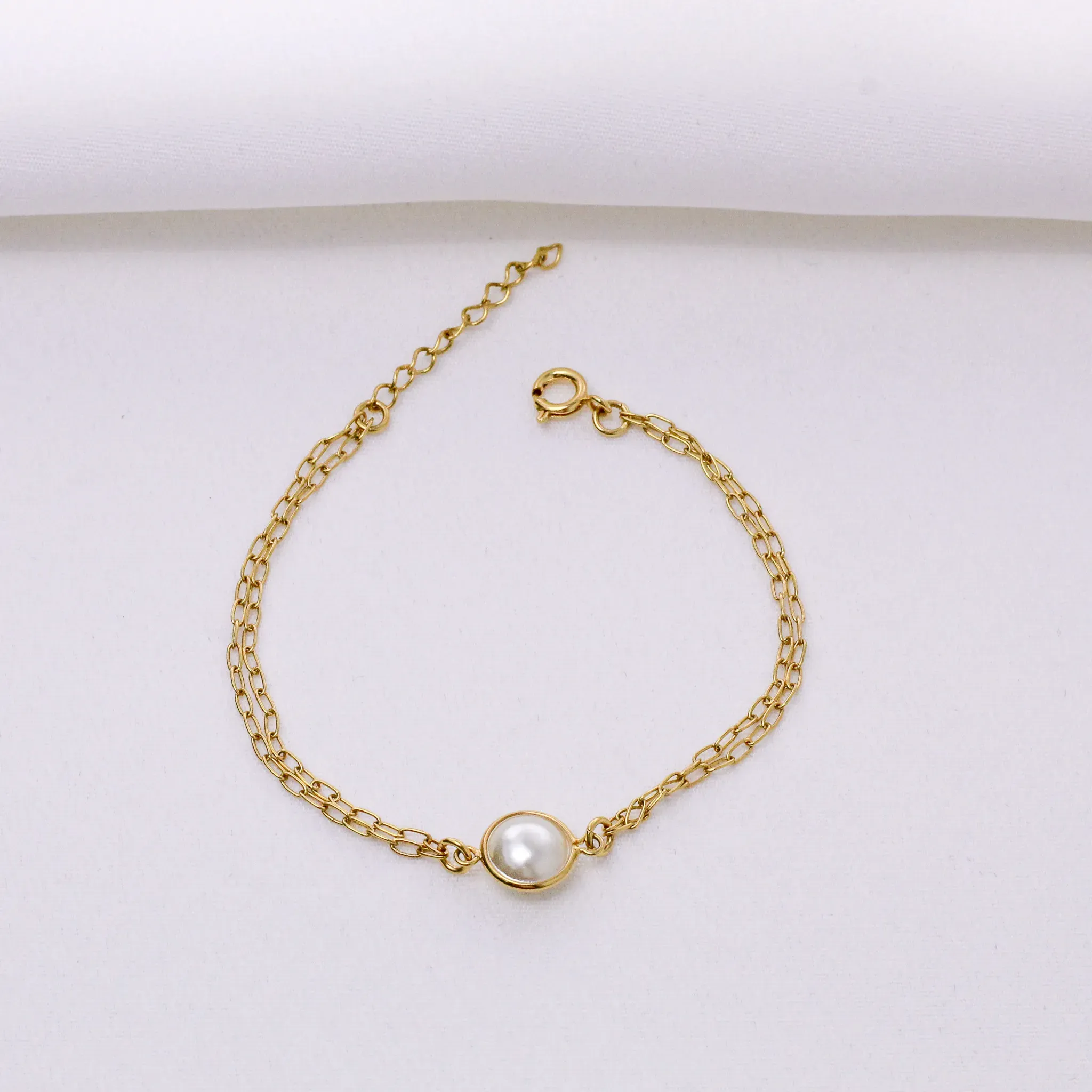 PULSEIRA COM UMA PÉROLA BANHO OURO 18K