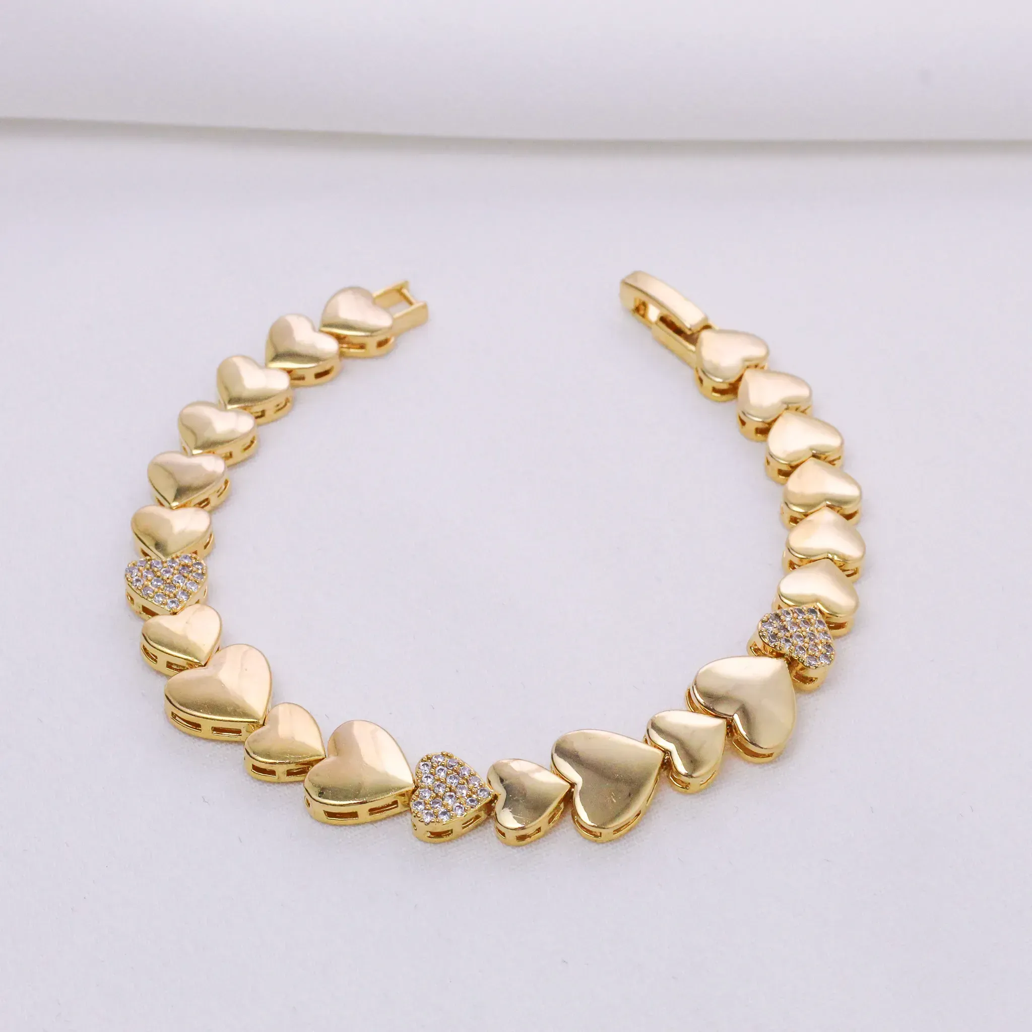 PULSEIRA CORAÇÃO LISO E COM ZIRCÔNIAS BANHO OURO 18K