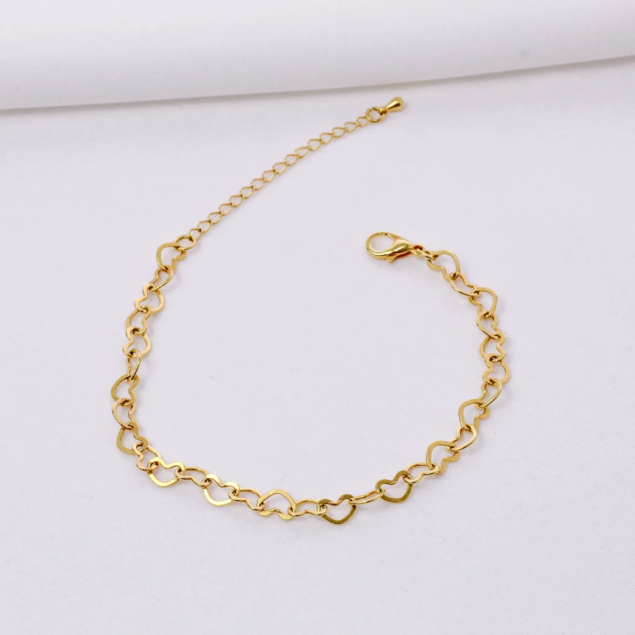 PULSEIRA ELOS CORAÇÃO M BANHO OURO 18K