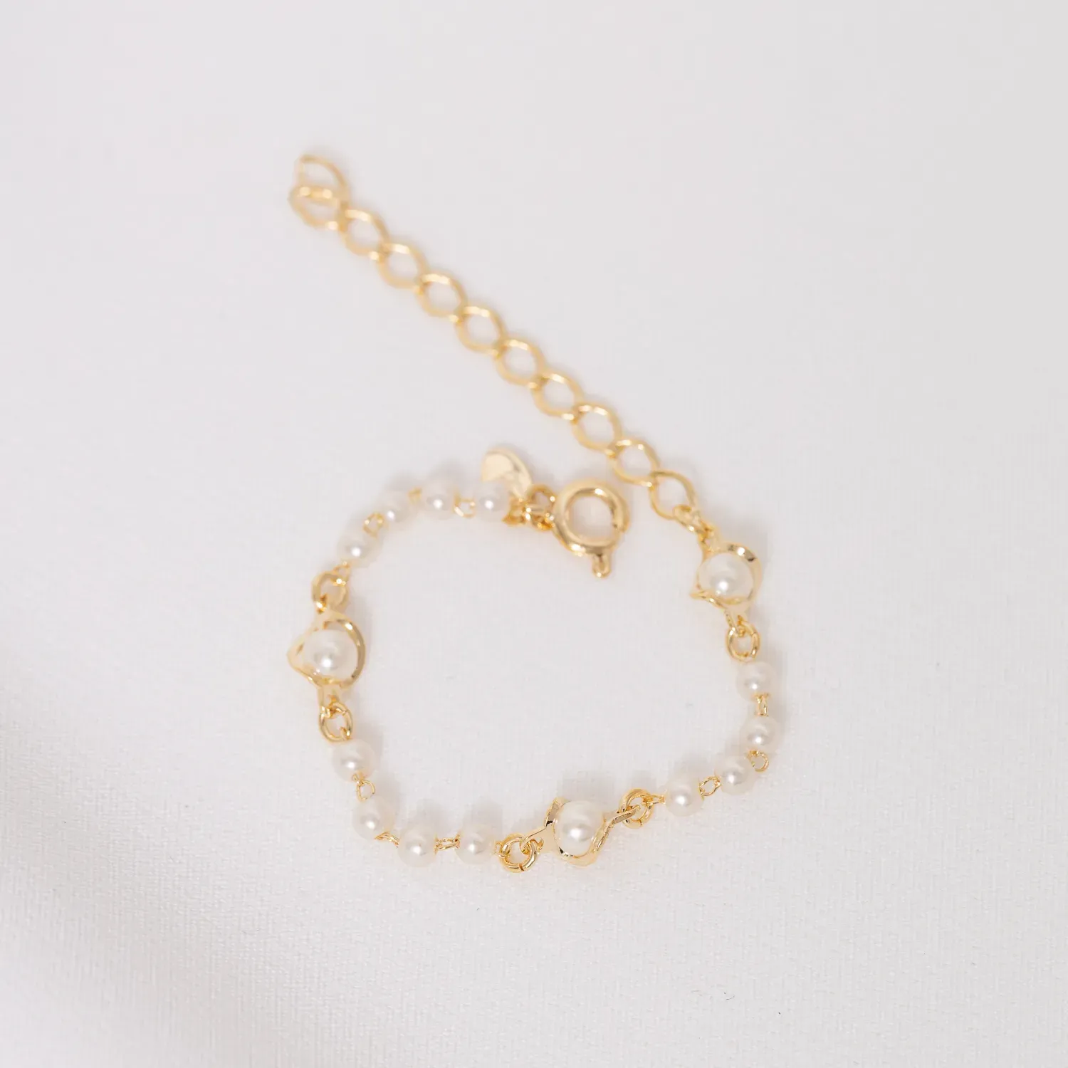 PULSEIRA INFANTIL PÉROLA BANHO OURO 18K