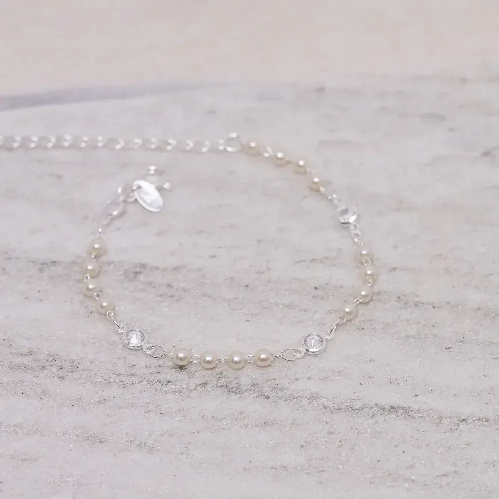 PULSEIRA PÉROLAS COM ZIRCÔNIAS BANHO PRATA