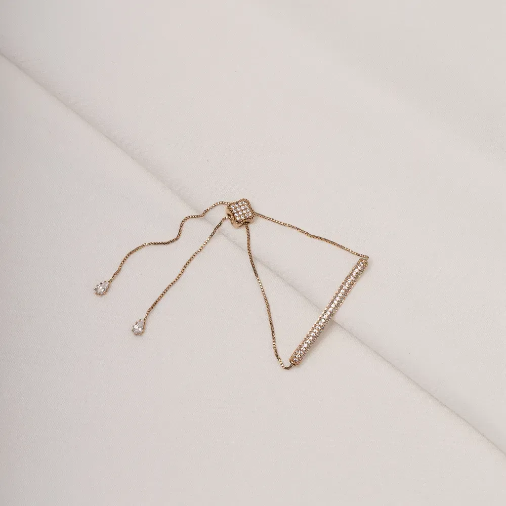 PULSEIRA COM ZIRCÔNIAS CRISTAIS FECHO GRAVATINHA BANHO ROSÉ