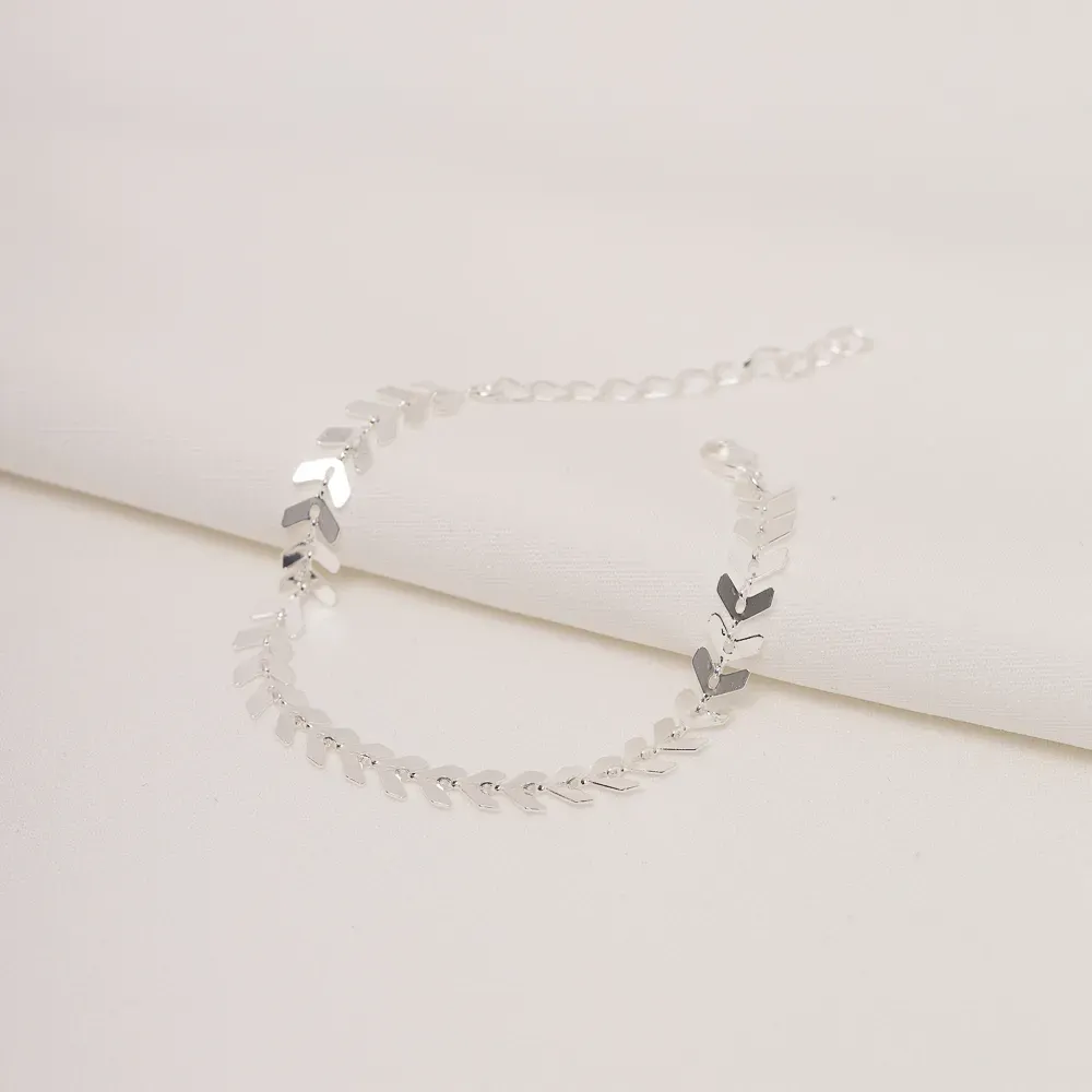 PULSEIRA ESCAMAS EM SETAS BANHO PRATA