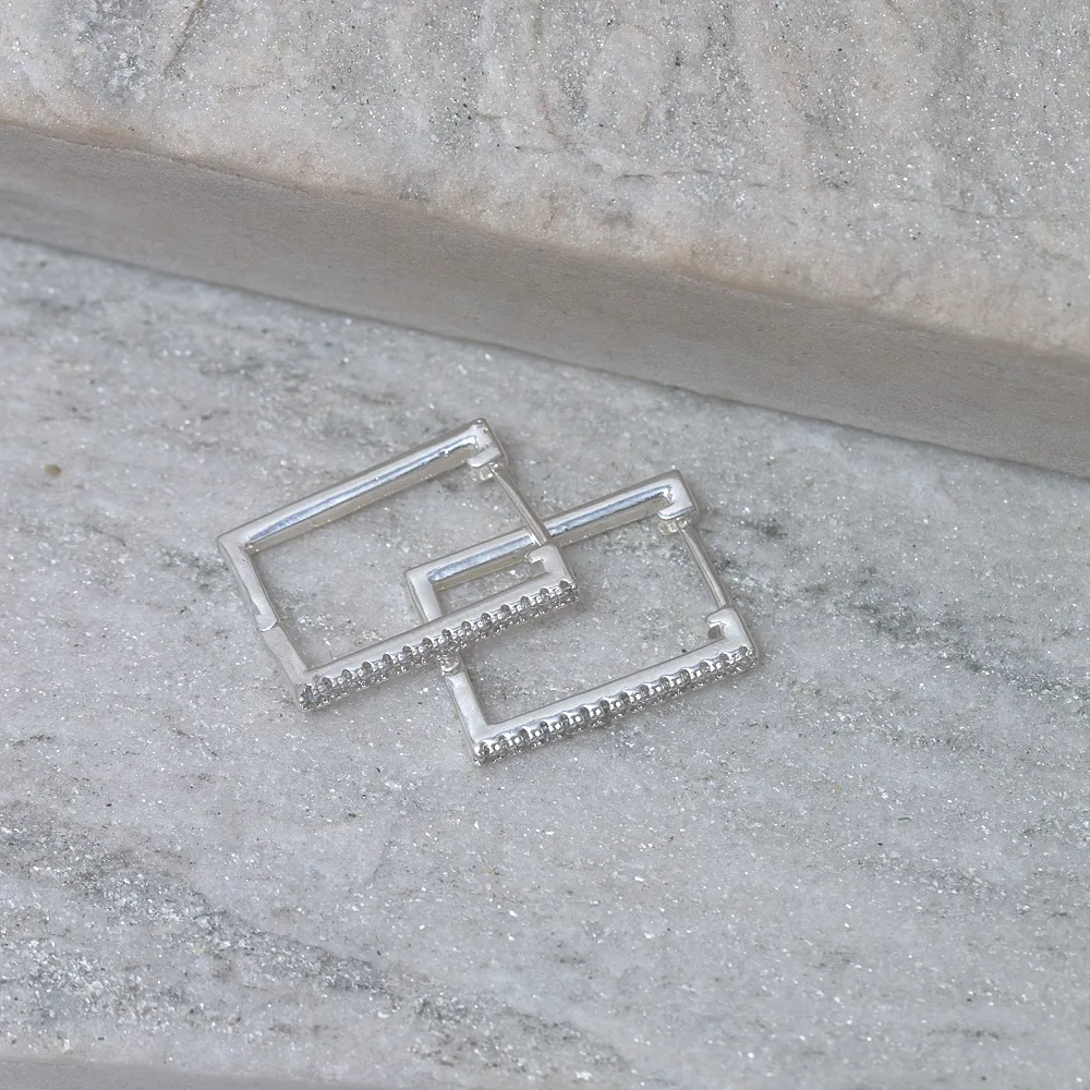BRINCO ARGOLA QUADRADA ZIRCÔNIA G BANHO PRATA