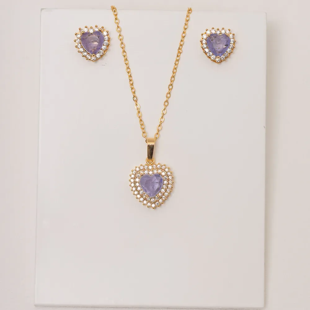 CONJUNTO CORAÇÃO COM PEDRA ZIRCÔNIA ROXA BANHO OURO 18K
