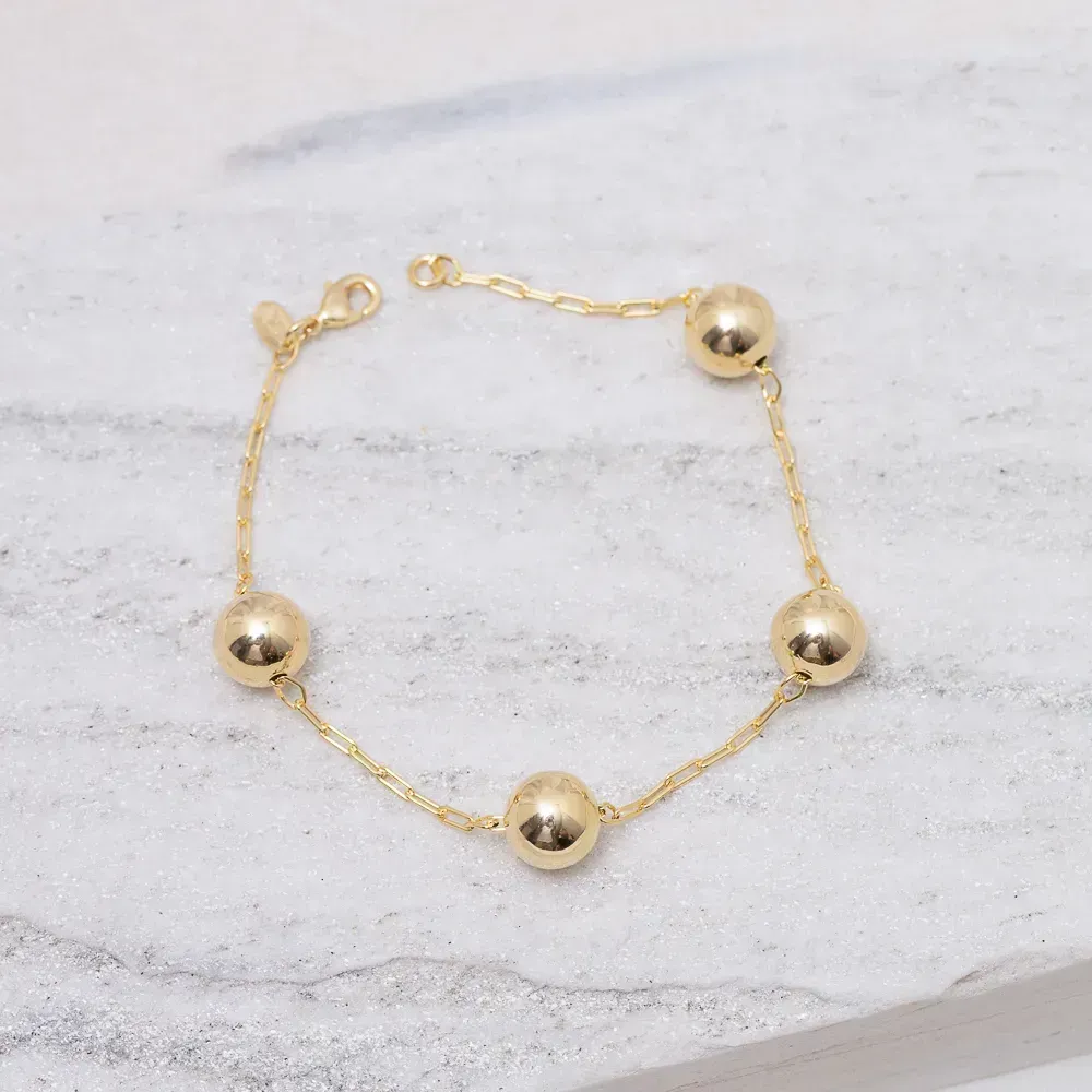 PULSEIRA BOLINHAS LISAS G BANHO OURO 18K