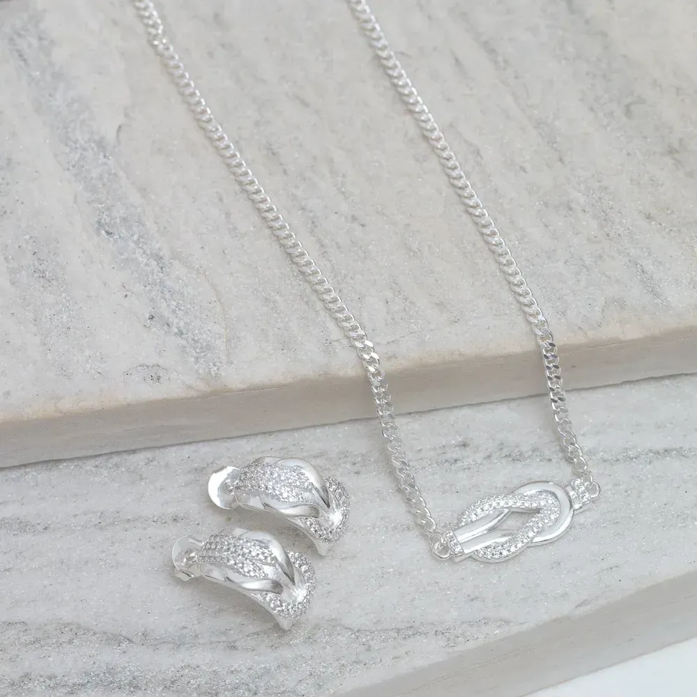 CONJUNTO NÓ LUXO FINO CRAVEJADO COM ZIRCÔNIAS CRISTAIS BANHO PRATA