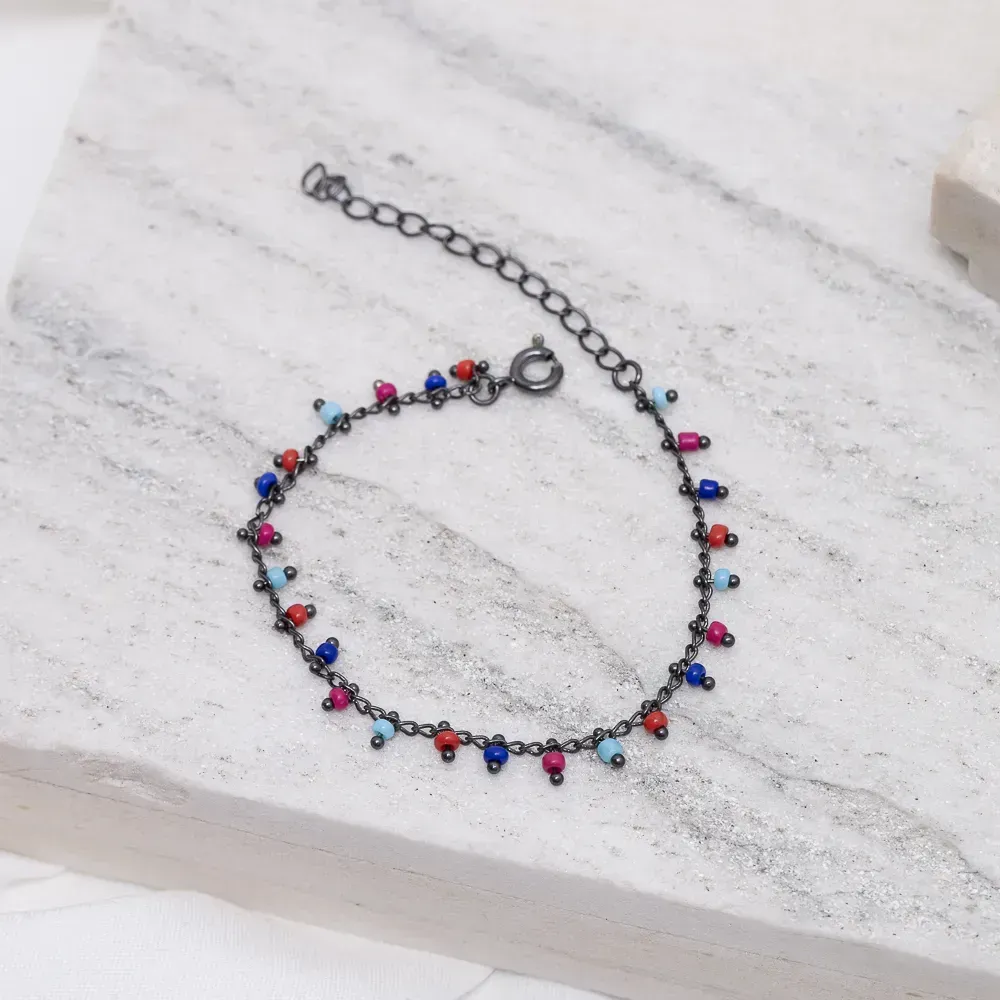 PULSEIRA INFANTIL BOLINHAS COLORIDAS BANHO RÓDIO NEGRO