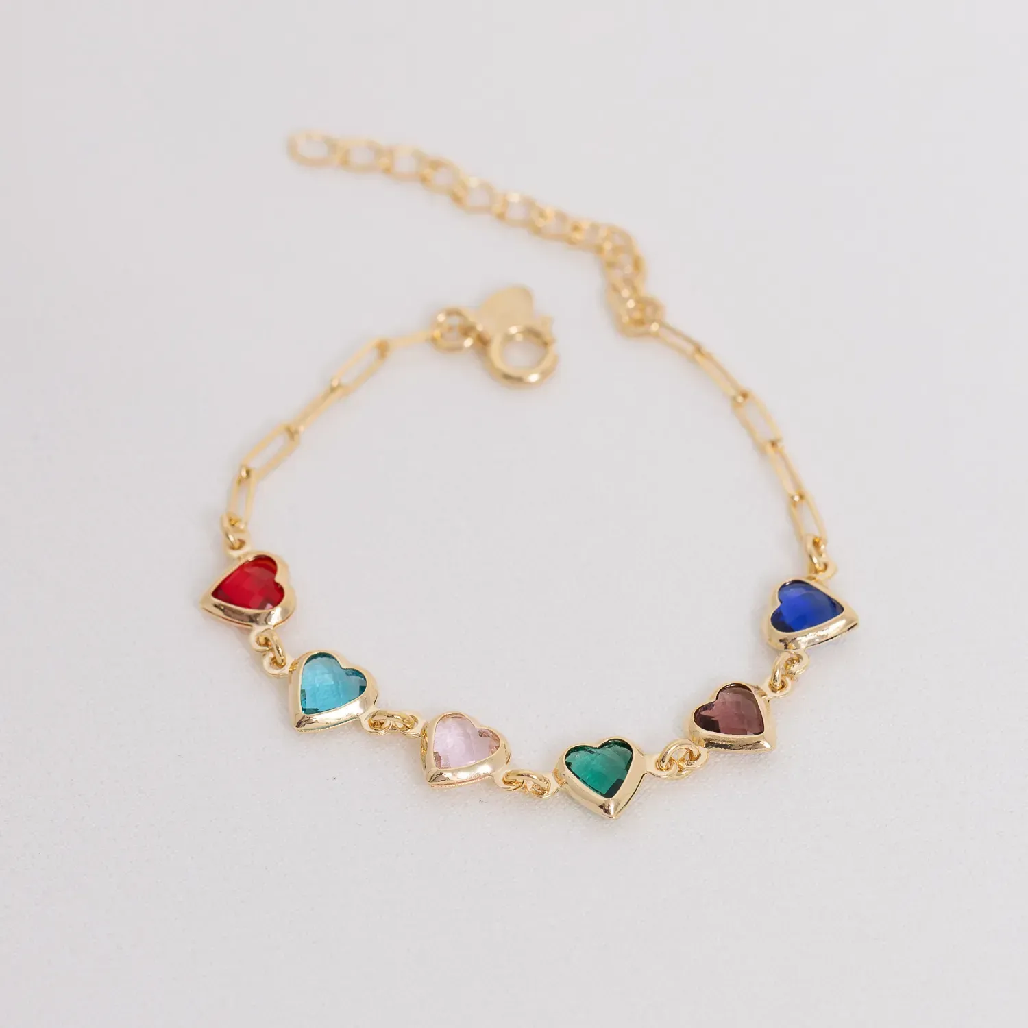 PULSEIRA CORAÇÕES COM PEDRAS COLORIDAS BANHO OURO 18K