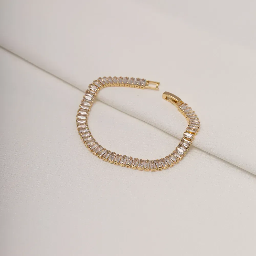 PULSEIRA RIVIERA COM ZIRCÔNIAS NAVETE CRISTAIS BANHO OURO 18K