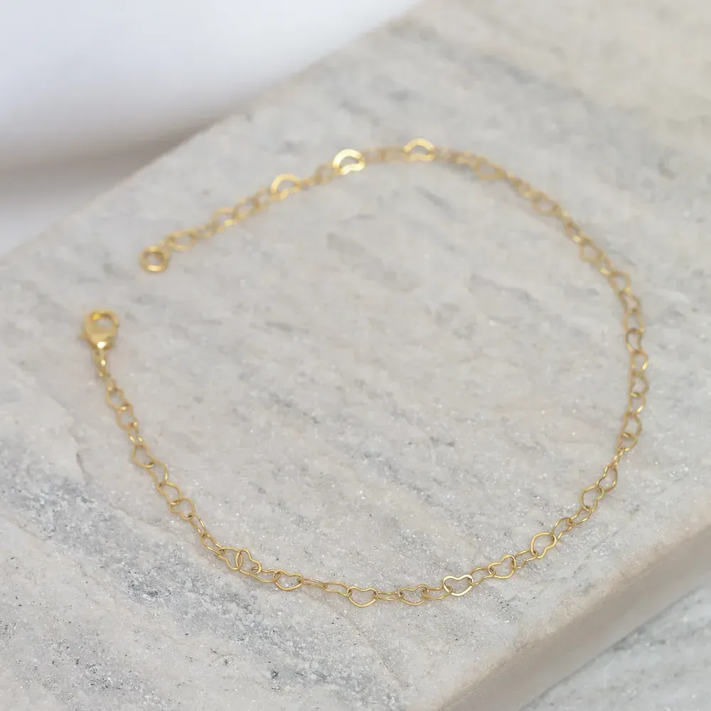 TORNOZELEIRA CORAÇÕES VAZADOS BANHO OURO 18K