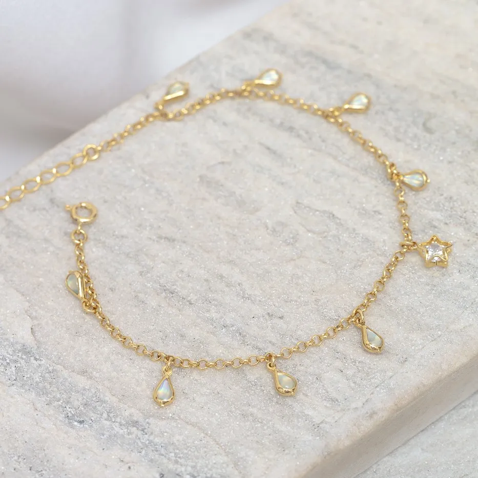 TORNOZELEIRA ESTRELA COM PEDRA GOTAS FURTA COR BANHO OURO 18K