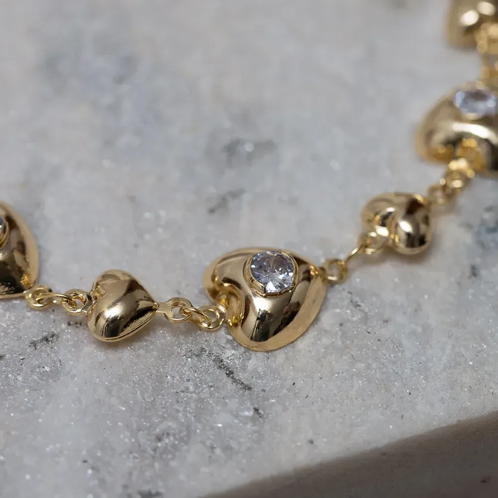 PULSEIRA CORAÇÕES COM ZIRCÔNIA CRISTAL BANHO OURO 18K