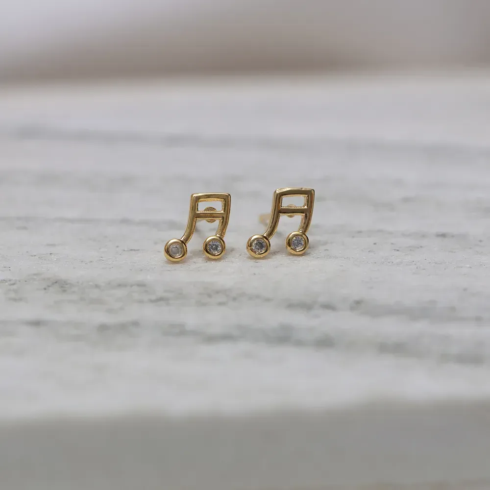 BRINCO NOTA MUSICAL COM ZIRCÔNIA BANHO OURO 18K