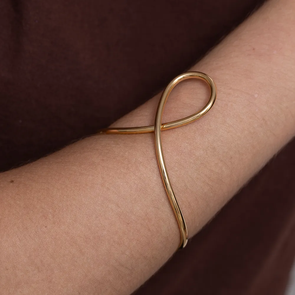 BRACELETE ORGÂNICO TORCIDO BANHO OURO 18K
