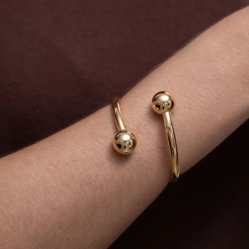BRACELETE DUAS ESFERAS BANHO OURO 18K