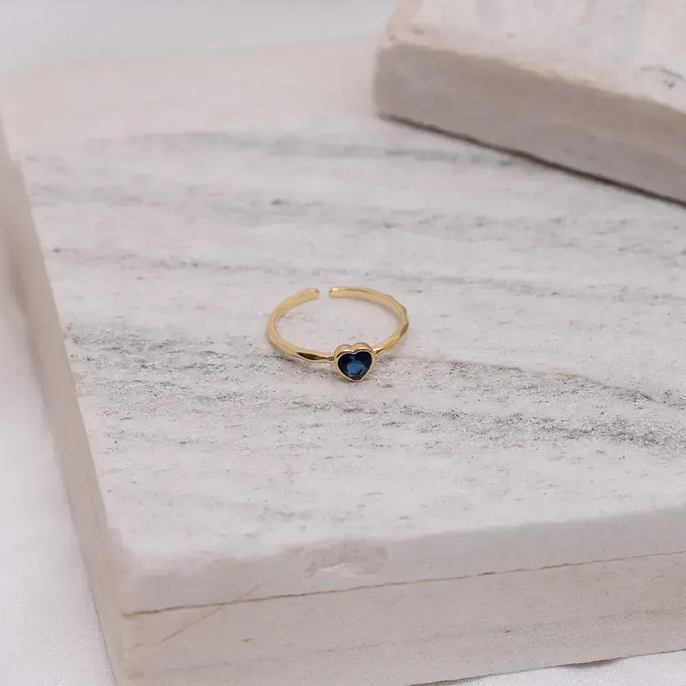 ANEL REGULÁVEL CORAÇÃO COM PEDRA AZUL BANHO OURO 18K