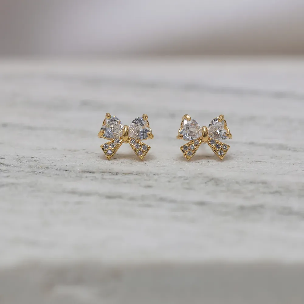 BRINCO LAÇO COM ZIRCÔNIA M BANHO OURO 18K