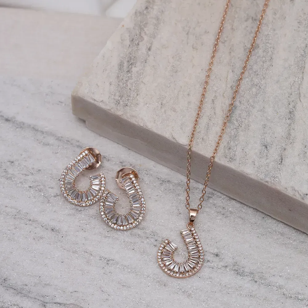 CONJUNTO COM ZIRCÔNIAS NAVETE CRISTAIS BANHO ROSÉ