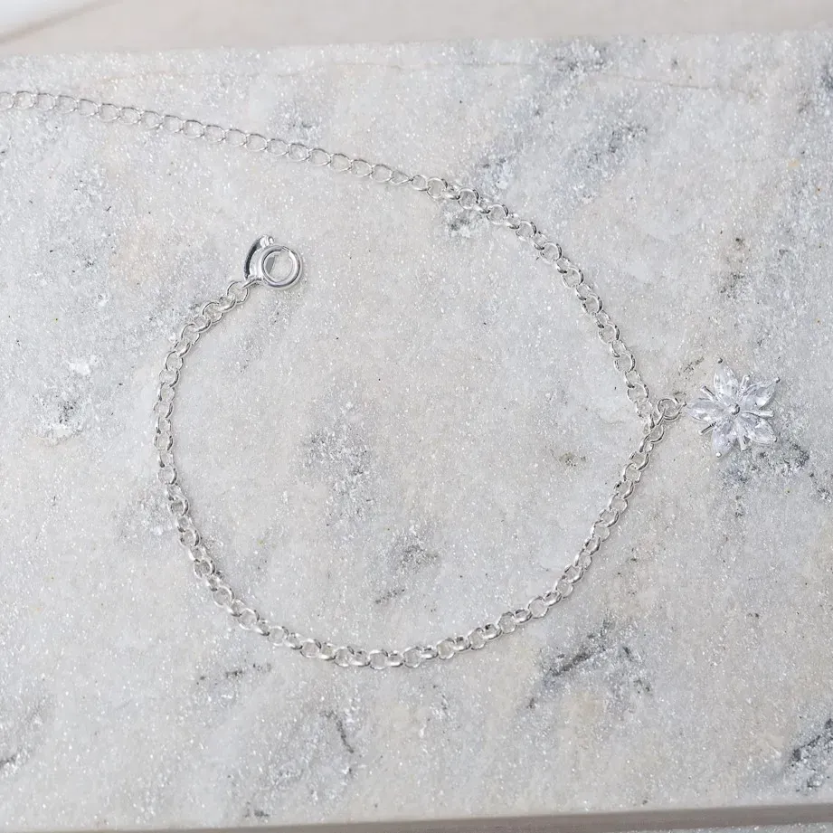 PULSEIRA ELO PORTUGUÊS COM FLOR CRISTAL BANHO PRATA