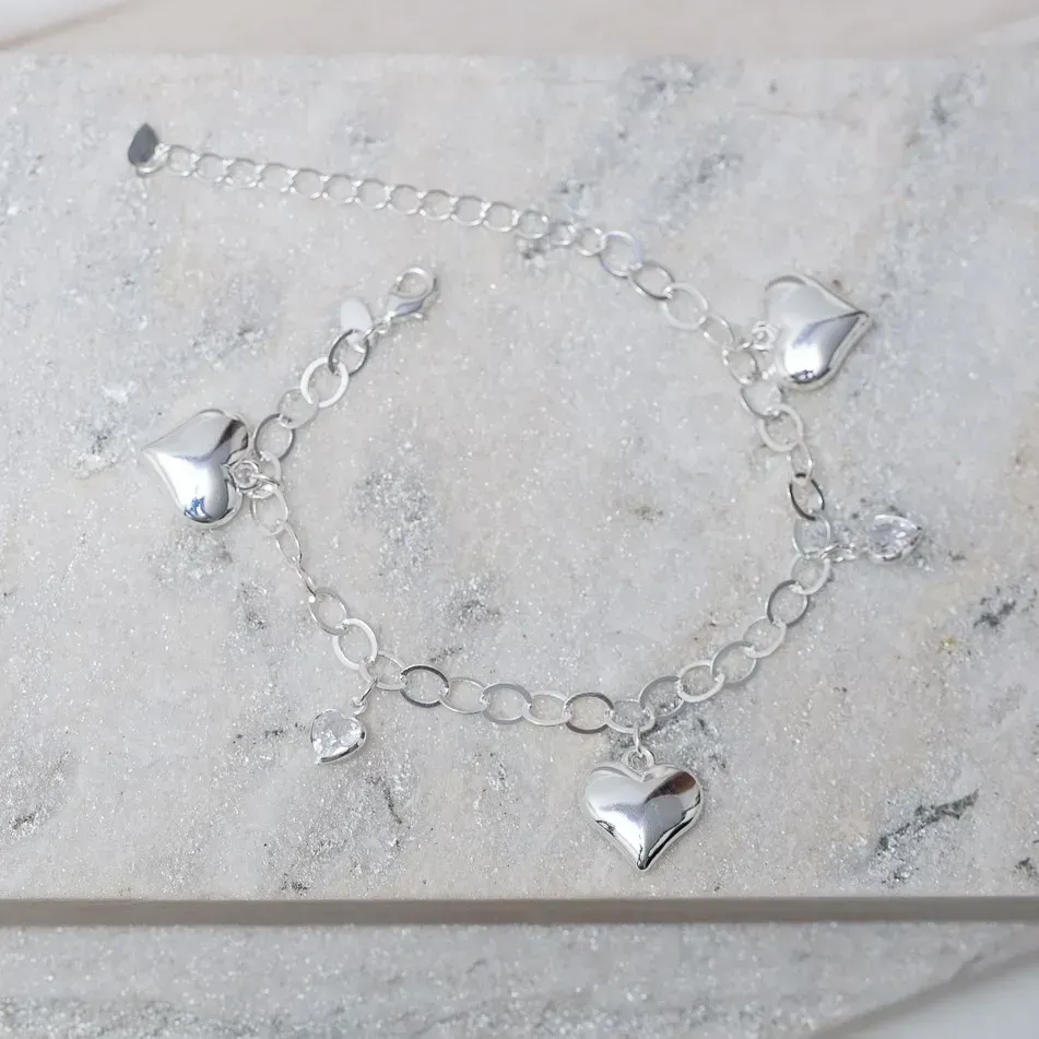 PULSEIRA ELOS COM PINGENTE CORAÇÃO CRISTAL E LISO BANHO PRATA