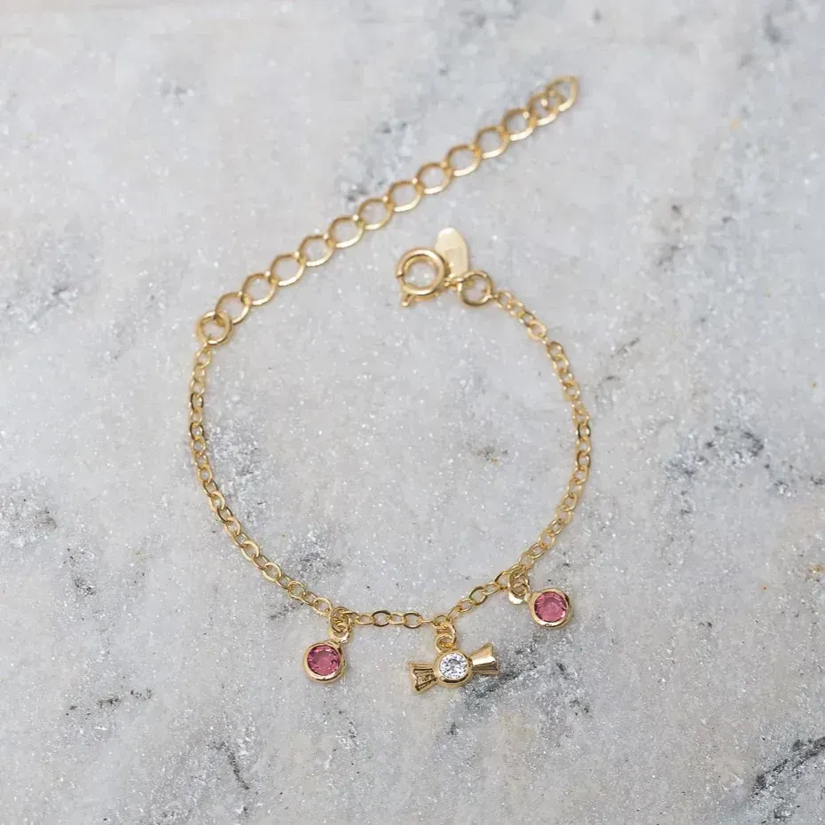 PULSEIRA INFANTIL BOMBOM COM CRISTAIS ROSAS BANHO OURO 18K