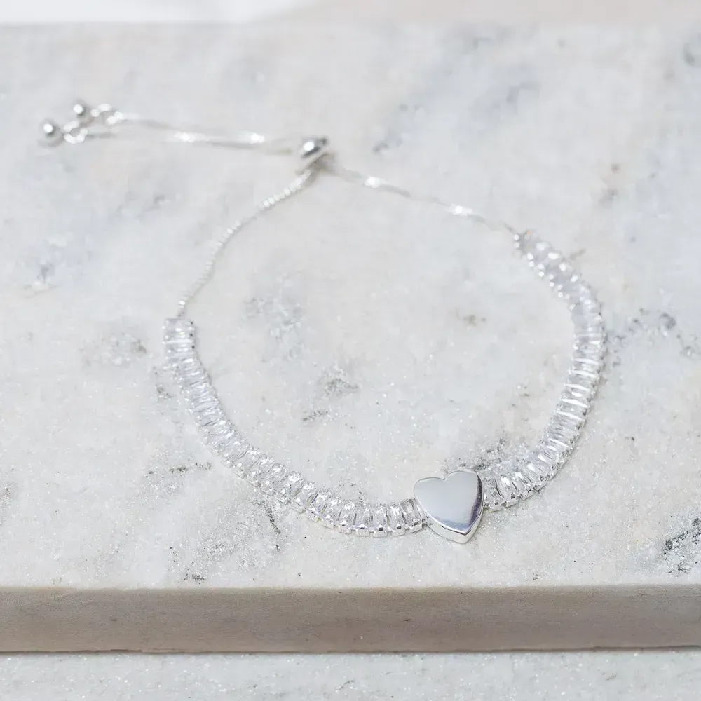 PULSEIRA RIVIERA CRISTAL REGULÁVEL COM CORAÇÃO BANHO PRATA