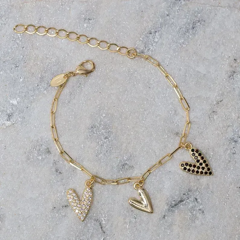 PULSEIRA TRÊS CORAÇÕES CRAVEJADO E LISO BANHO OURO 18K