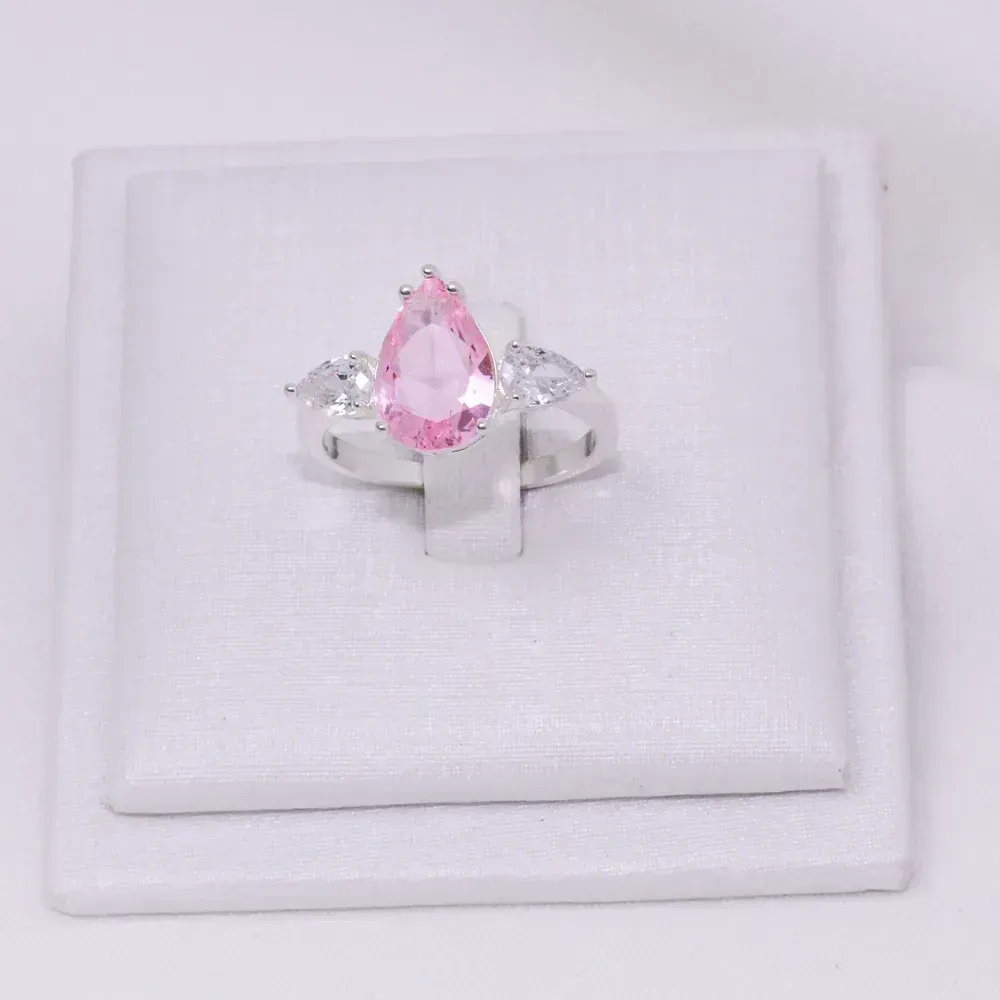 ANEL FORMATURA GOTA COM PEDRA ROSA IOGURTE BANHO PRATA