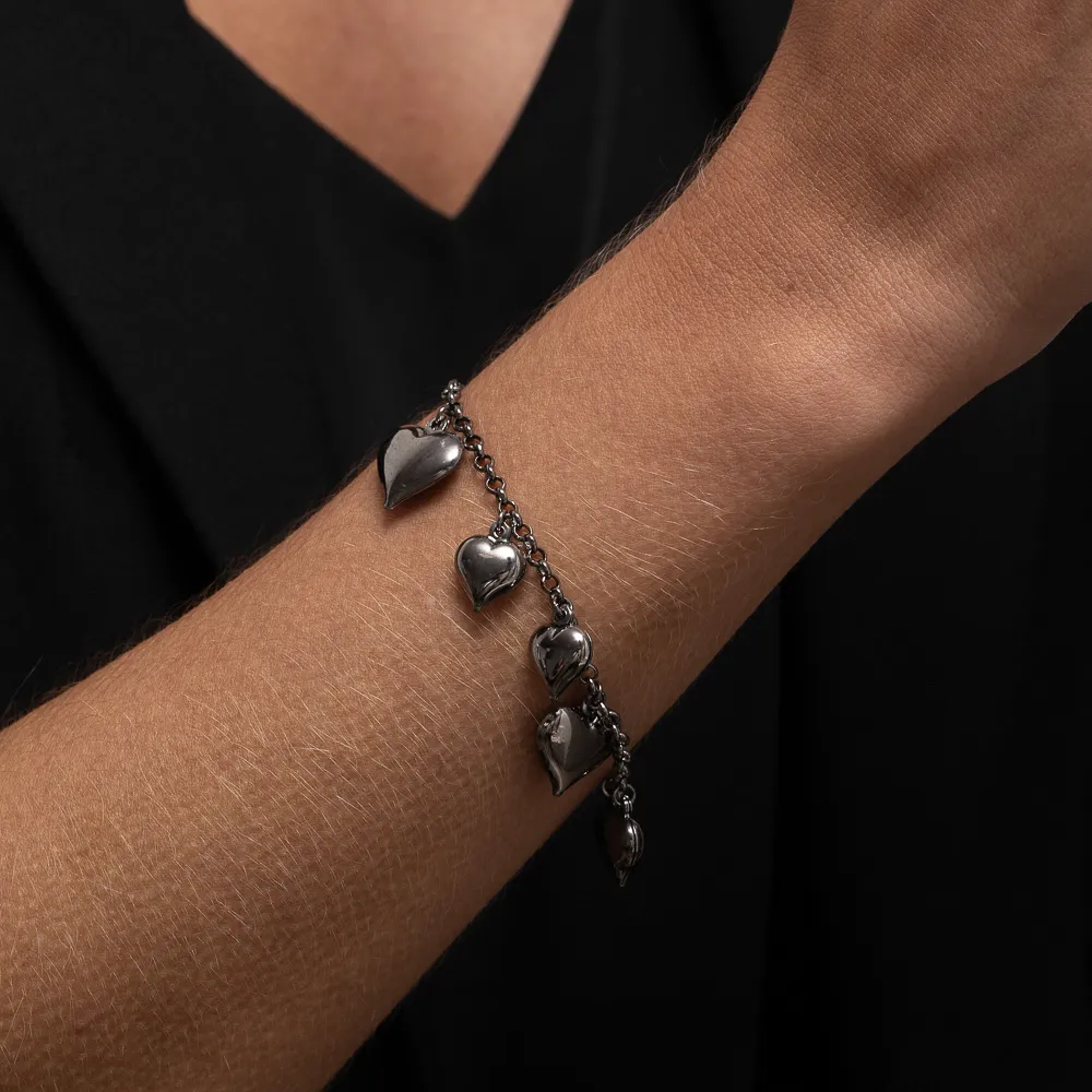 PULSEIRA COM PINGENTE CORAÇÕES BANHO RÓDIO NEGRO