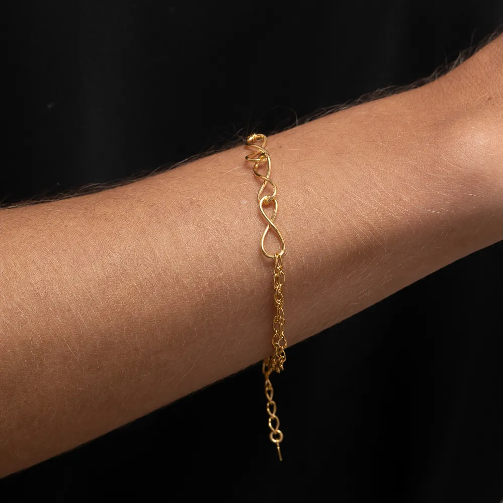 PULSEIRA TRÊS INFINITOS BANHO OURO 18K