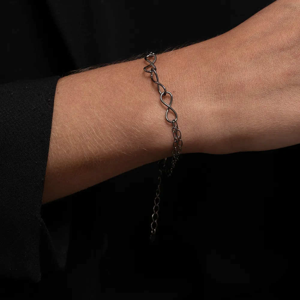 PULSEIRA TRÊS INFINITOS BANHO RÓDIO NEGRO