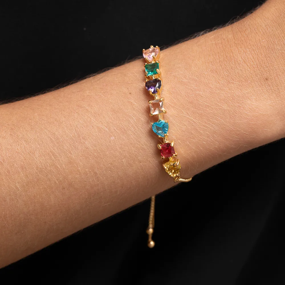PULSEIRA CORAÇÃO COM PEDRAS COLORIDAS FECHO GRAVATINHA BANHO OURO 18K