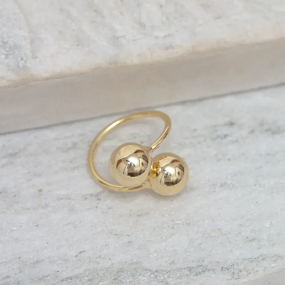 ANEL DUAS ESFERAS BANHO OURO 18K