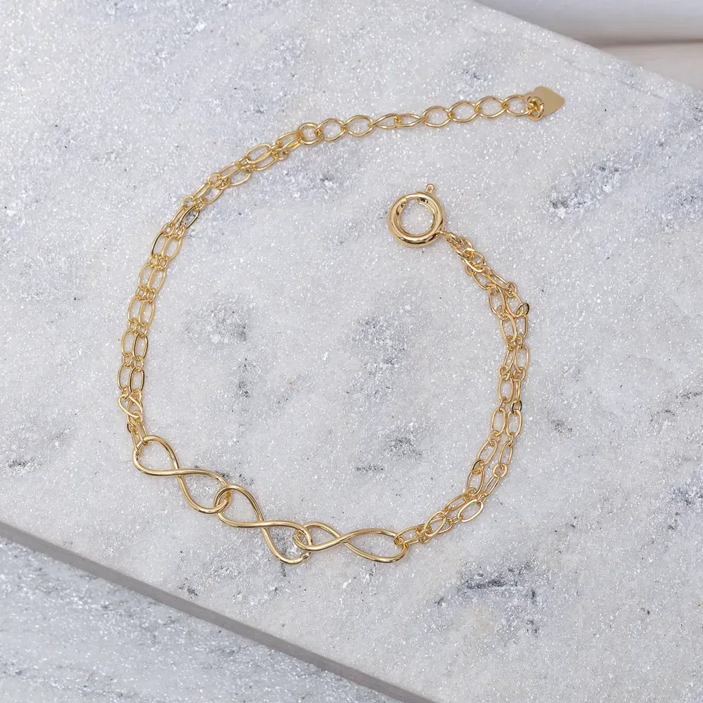 PULSEIRA TRÊS INFINITOS BANHO OURO 18K