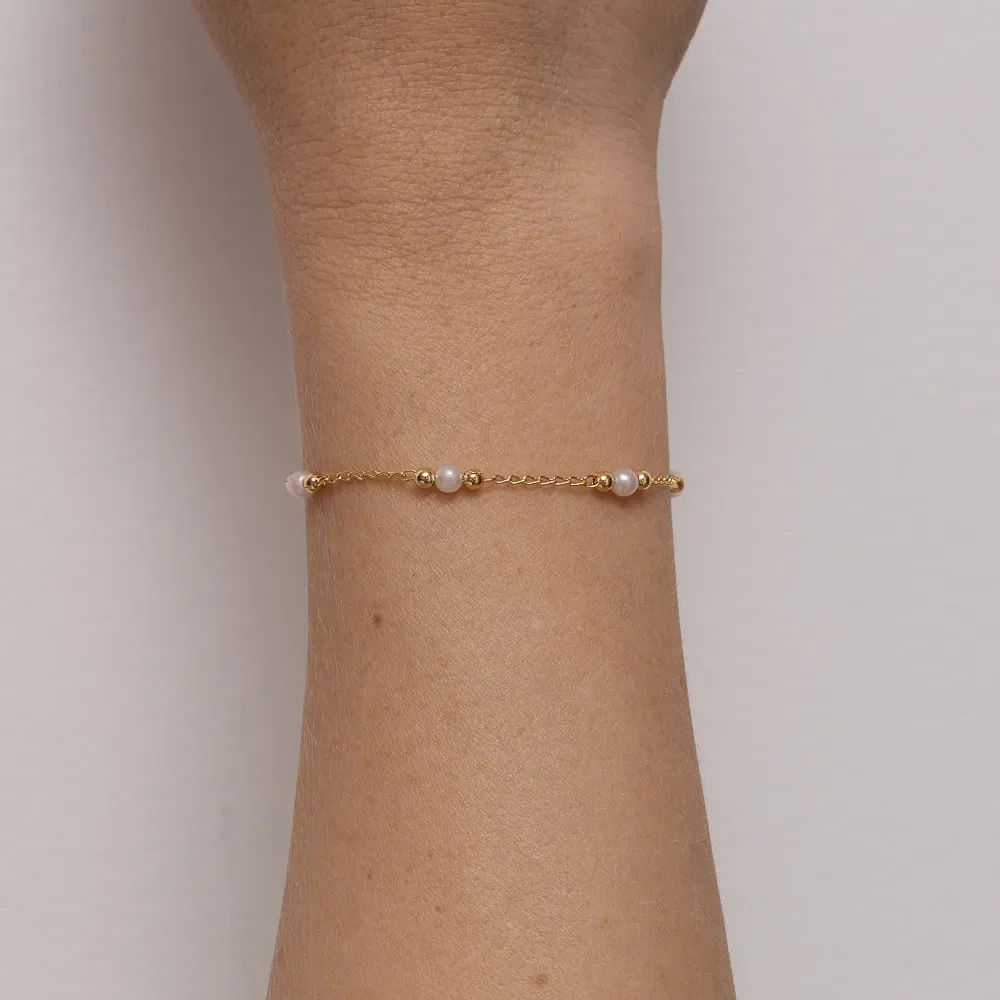 PULSEIRA BOLINHA E PÉROLA P BANHO OURO 18K