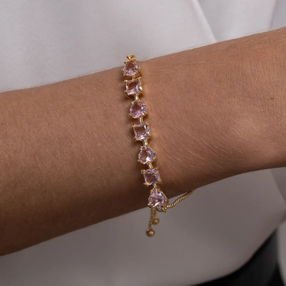 PULSEIRA CORAÇÃO COM PEDRAS ROSA CLARO FECHO GRAVATINHA BANHO OURO 18K