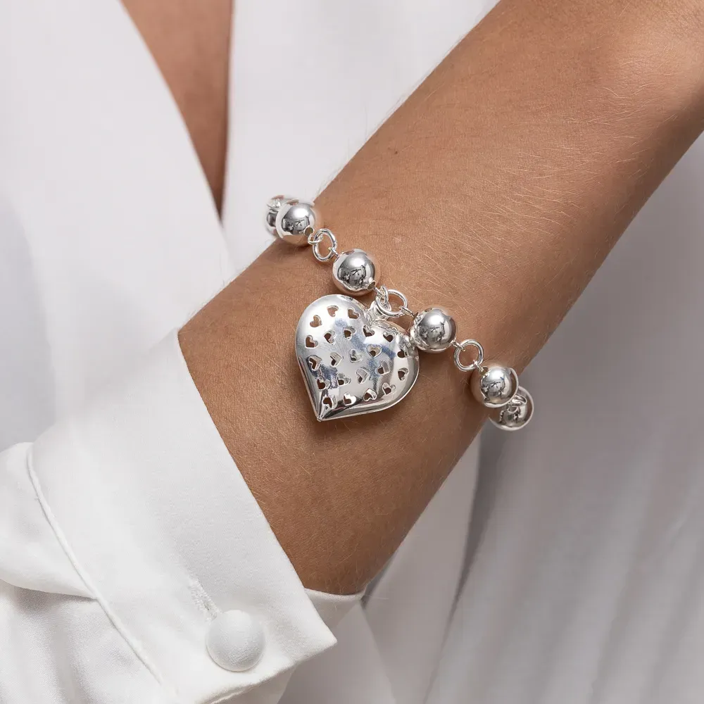 PULSEIRA BOLINHAS G COM PINGENTE CORAÇÃO BANHO PRATA
