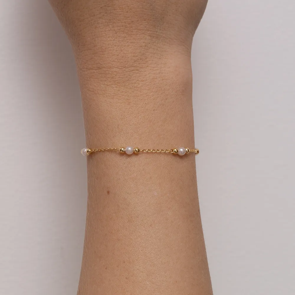 PULSEIRA INFANTIL BOLINHA COM PERÓLA BANHO OURO 18K