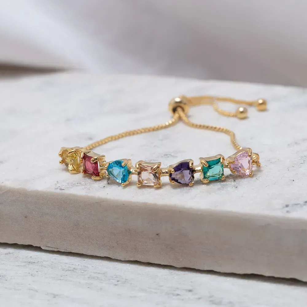 PULSEIRA CORAÇÃO COM PEDRAS COLORIDAS FECHO GRAVATINHA BANHO OURO 18K