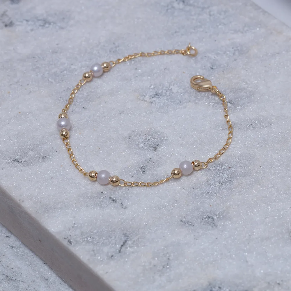 PULSEIRA INFANTIL BOLINHA COM PERÓLA BANHO OURO 18K