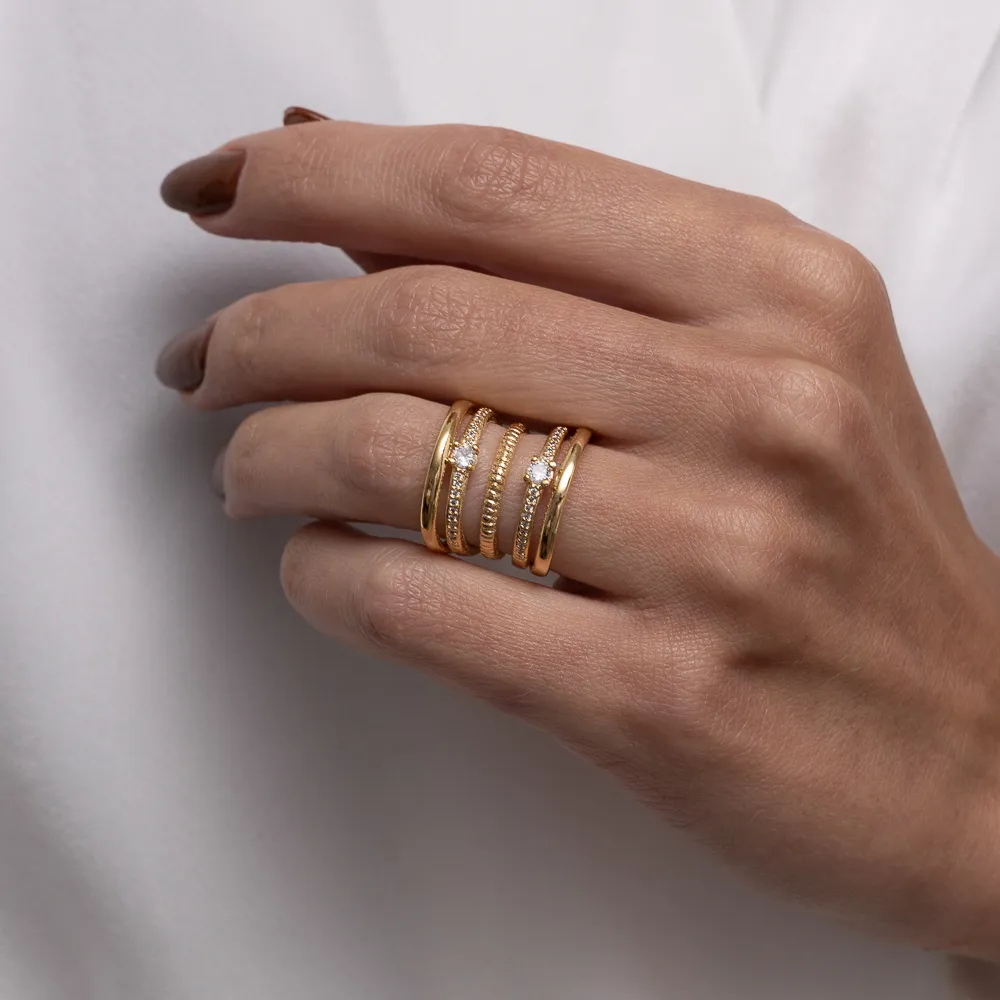 ANEL 5 AROS COM ZIRCÔNIAS CRISTAIS BANHO OURO 18K